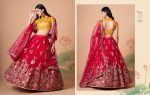 Glamorous Mirror Work Net Wedding Wear Lehenga Choli