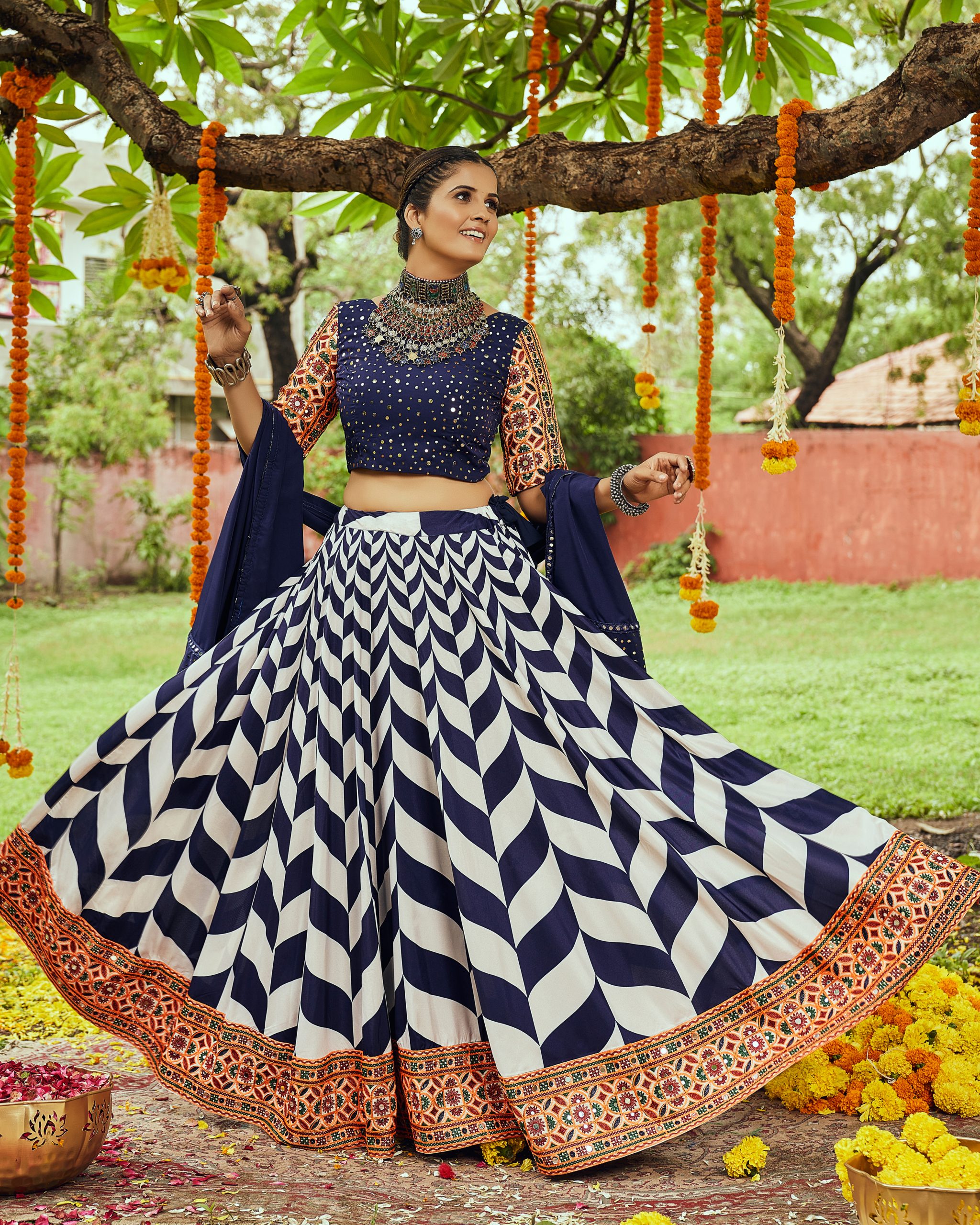 Enchanting Navratri: Unleash Your Inner Goddess With Our Dazzling Collection Of Chaniya Cholis, Lehengas, And Exquisite Accessories.