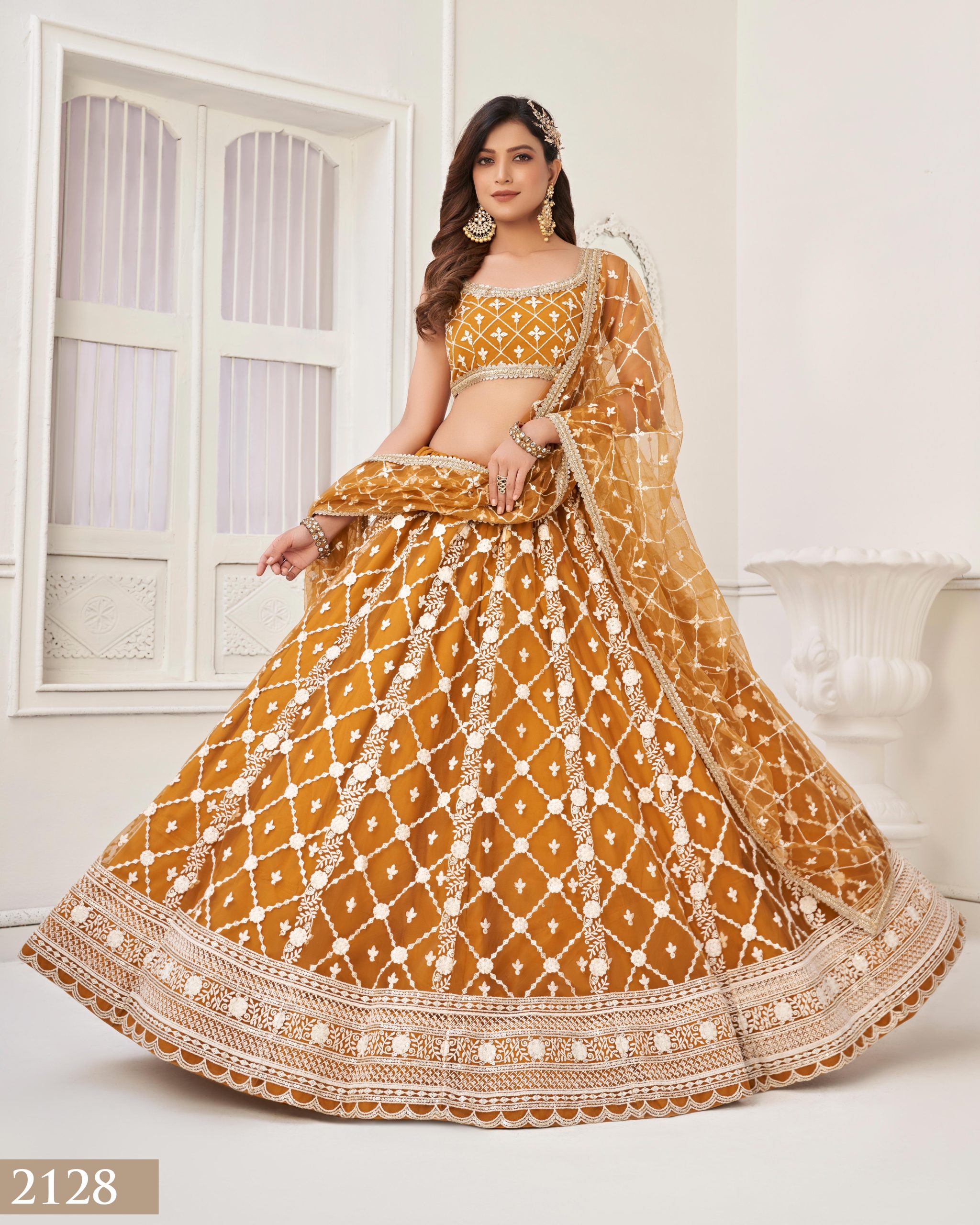 Embrace Grace and Glamour in our Semi-Stitched Designer Butterfly Net Wedding Wear Lehenga Choli Your Perfect Bridal Ensemble
