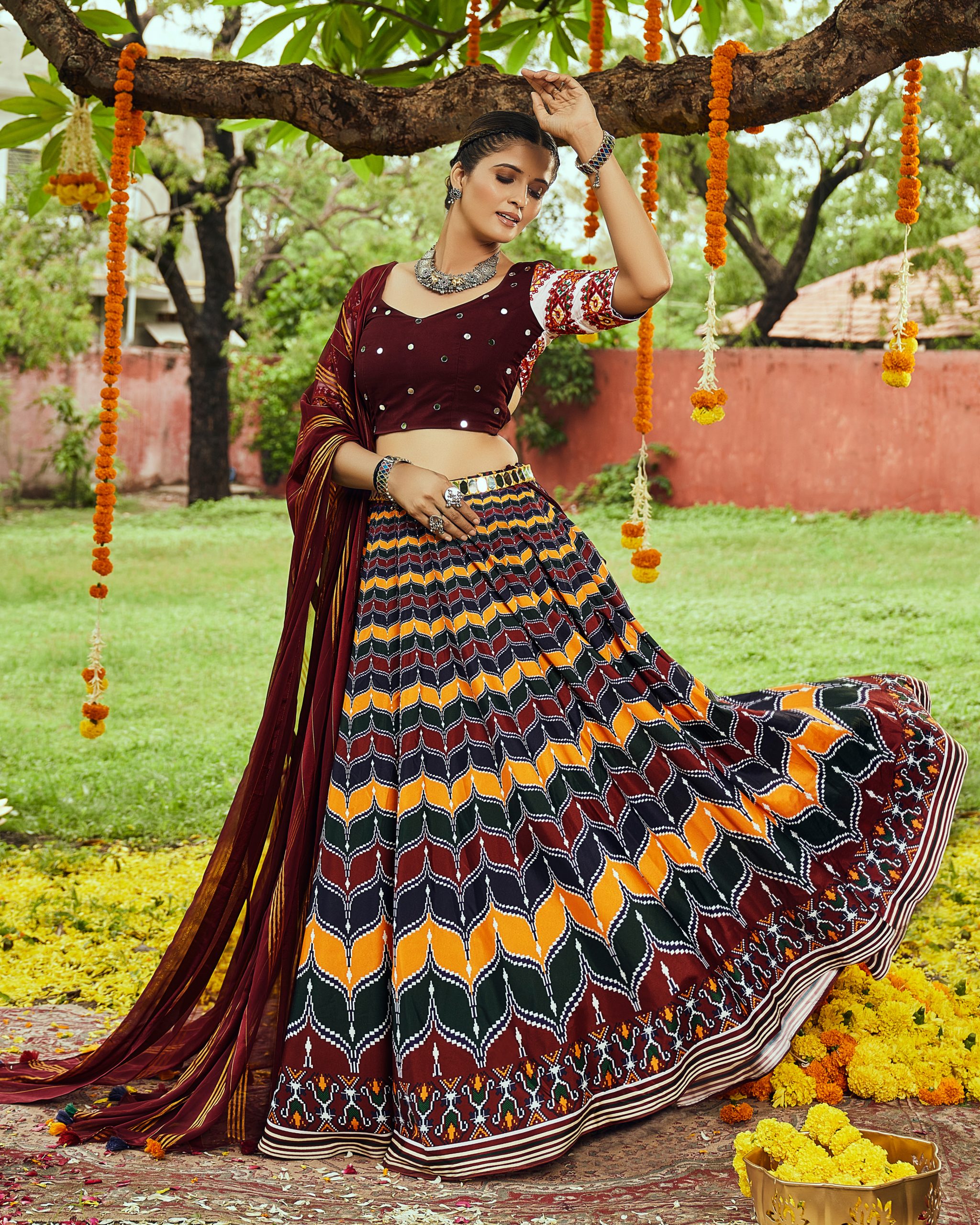 Enchanting Navratri: Unleash Your Inner Goddess With Our Dazzling Collection Of Chaniya Cholis, Lehengas, And Exquisite Accessories.