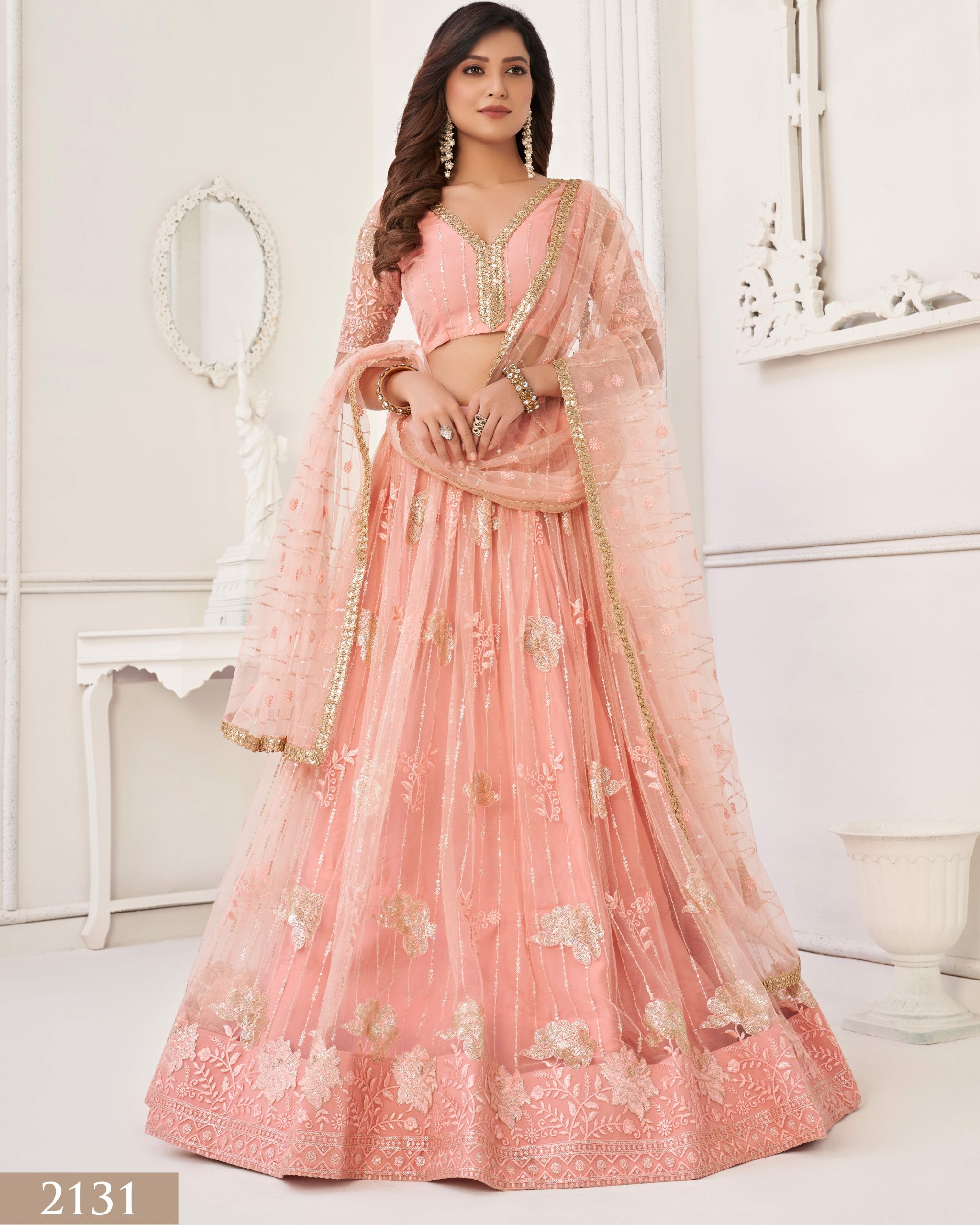Embrace Grace and Glamour in our Semi-Stitched Designer Butterfly Net Wedding Wear Lehenga Choli Your Perfect Bridal Ensemble