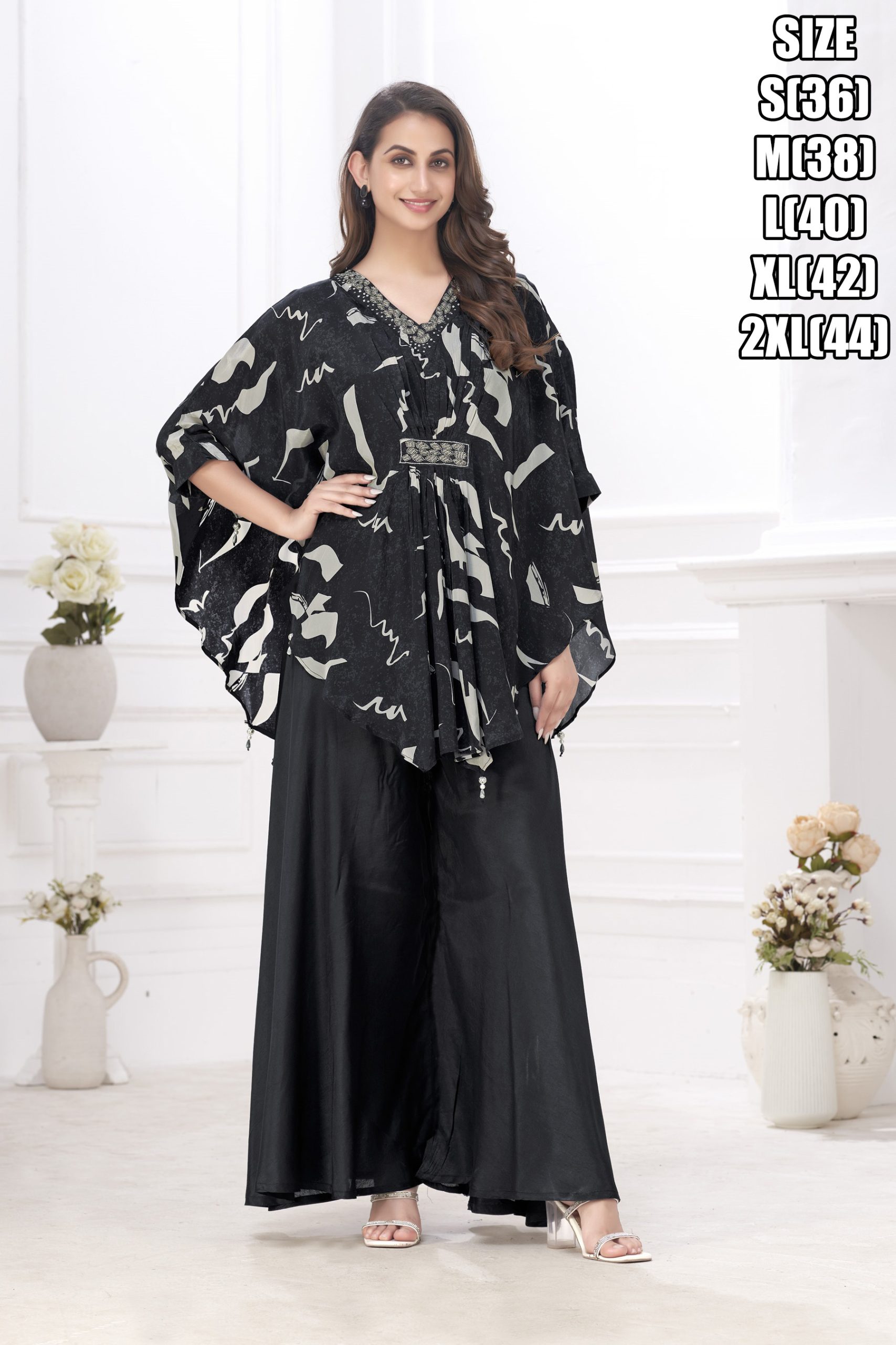 Effortless Style With Our Readymade Pure Muslin Poncho Style Top And Palazzo Set A Fusion Of Comfort And Chic Glamour