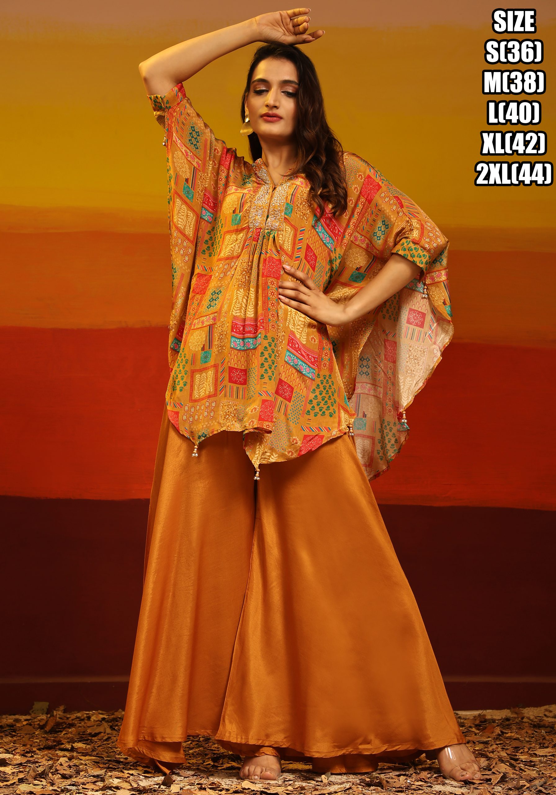 Effortless Style With Our Readymade Pure Muslin Poncho Style Top And Palazzo Set A Fusion Of Comfort And Chic Glamour