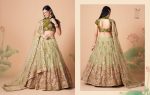 Glamorous Mirror Work Net Wedding Wear Lehenga Choli