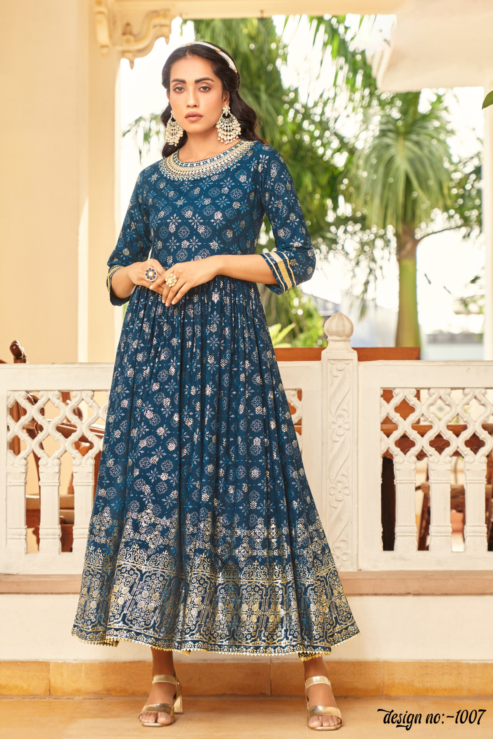 Designer Gown Style With Classic Reyon Foil Prints And Fancy Embroidery Work Embrace Elegance In This Stunning Ensemble
