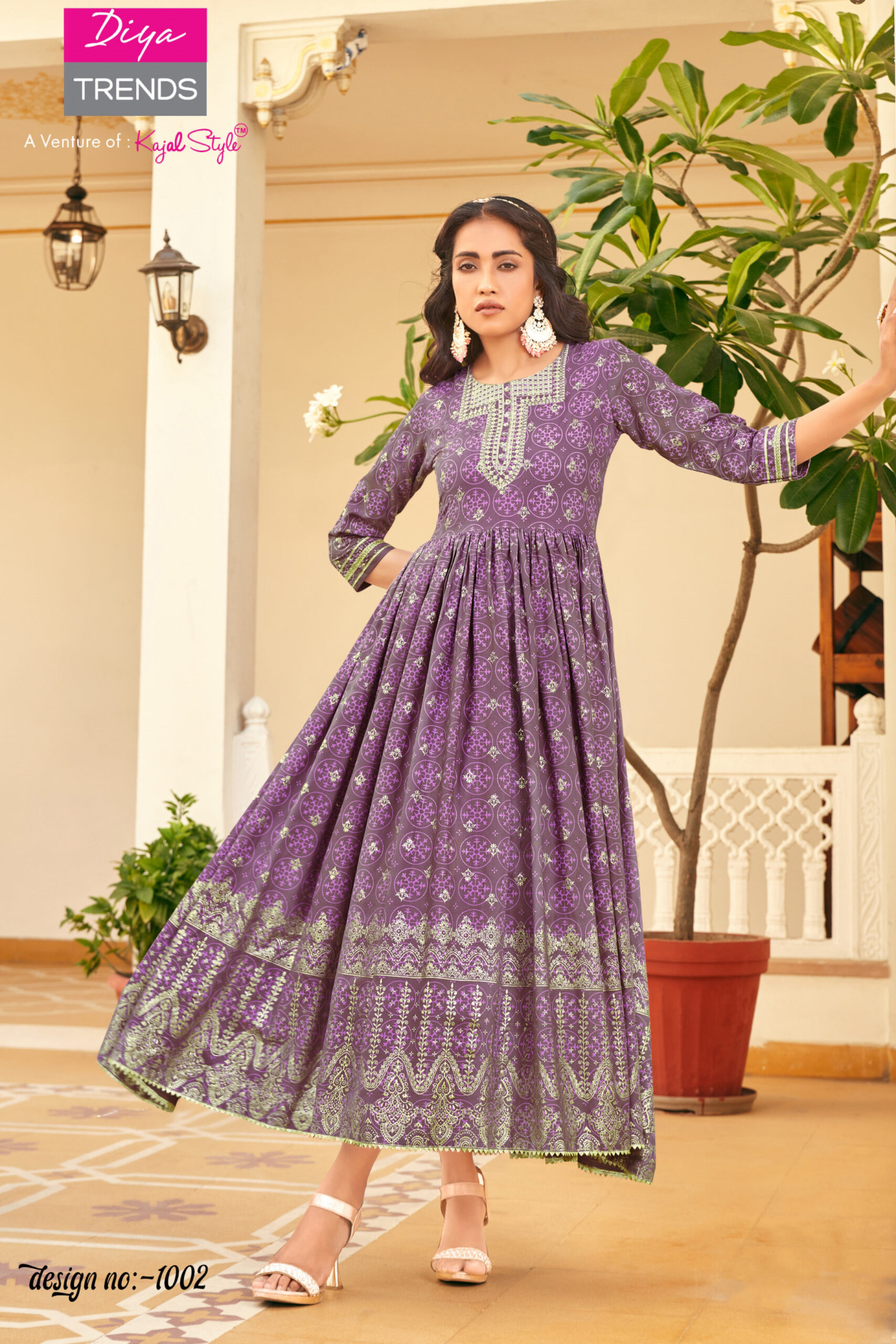 Designer Gown Style With Classic Reyon Foil Prints And Fancy Embroidery Work Embrace Elegance In This Stunning Ensemble