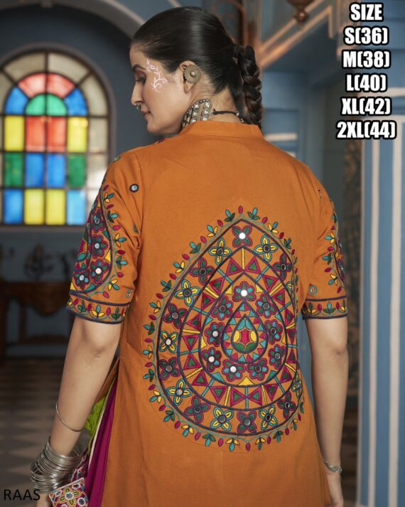 This Outfit Can Wear In A Navratri Festival In Features A Stylish Crop Top, Jacket And Matching Lehengas Made From Viscose Rayon