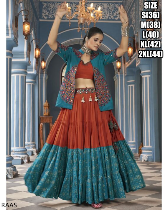 This Outfit Can Wear In A Navratri Festival In Features A Stylish Crop Top, Jacket And Matching Lehengas Made From Viscose Rayon