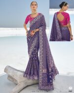 Available Luxurious Bandhani Patola Un-Stitched Saree With Contrast Colour Blouse