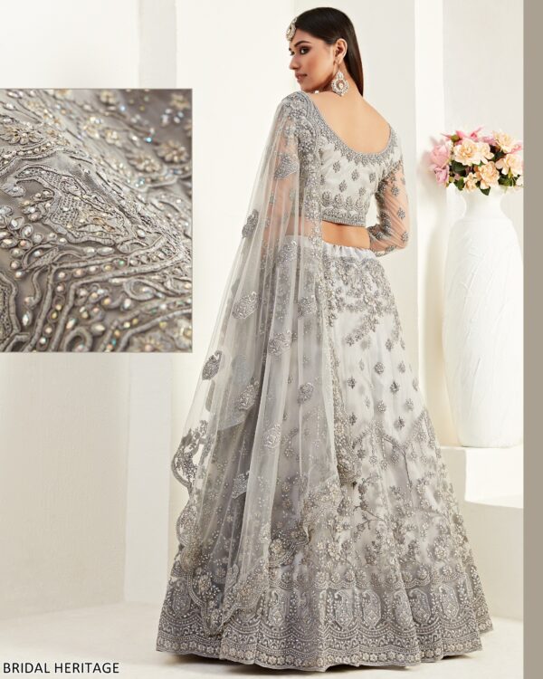 Captivating Cording Embroidered Net Wedding Wear Semi-Stitched Lehenga Choli