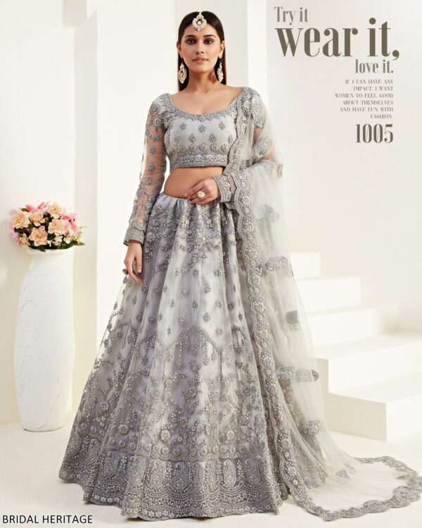 Captivating Cording Embroidered Net Wedding Wear Semi-Stitched Lehenga Choli