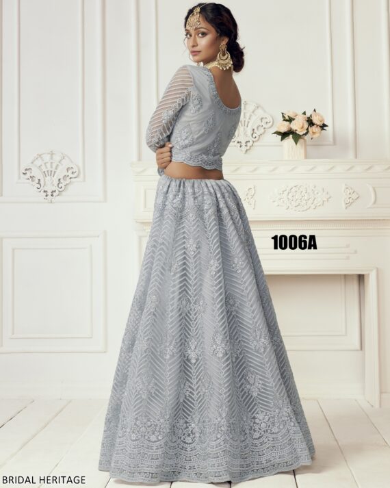 Captivating Cording Embroidered Net Wedding Wear Semi-Stitched Lehenga Choli