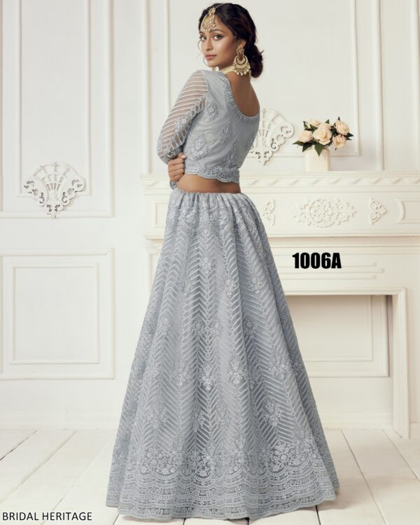 Captivating Cording Embroidered Net Wedding Wear Semi-Stitched Lehenga Choli