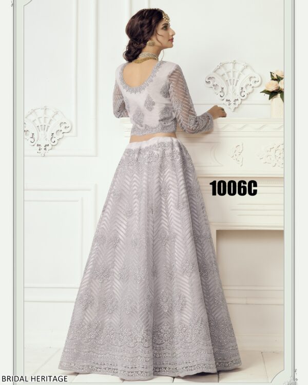 Captivating Cording Embroidered Net Wedding Wear Semi-Stitched Lehenga Choli