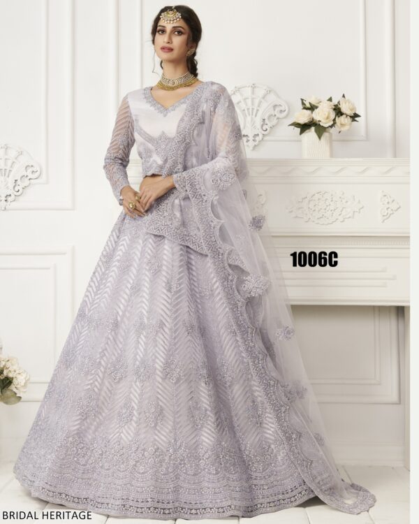 Captivating Cording Embroidered Net Wedding Wear Semi-Stitched Lehenga Choli