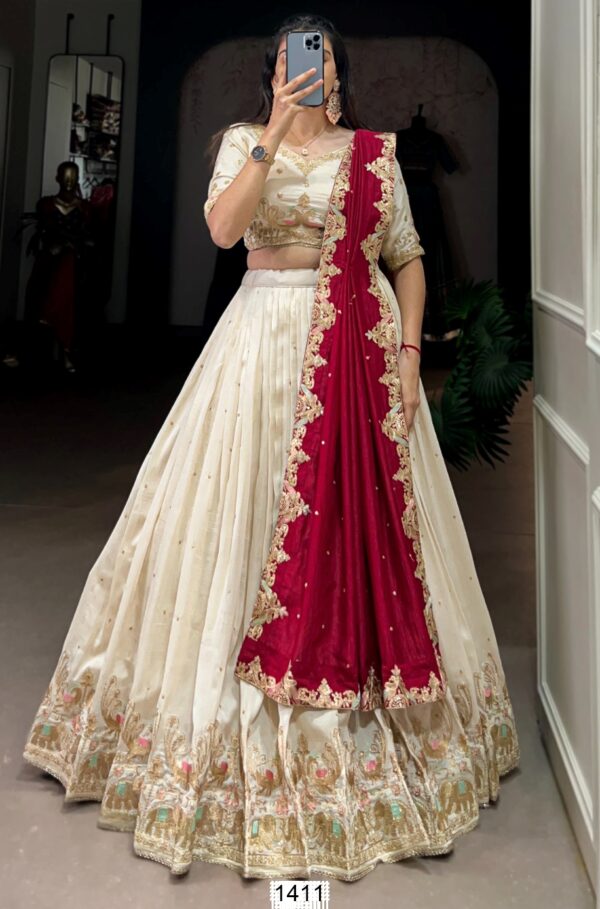 Immaculate Designs And Well-Crafted Off-White Lehenga Choli With Red Dupatta