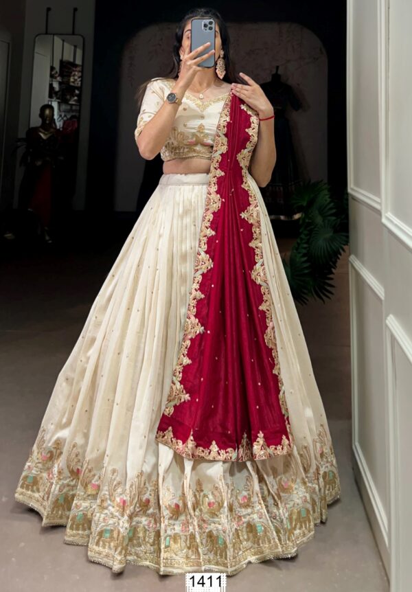 Immaculate Designs And Well-Crafted Off-White Lehenga Choli With Red Dupatta