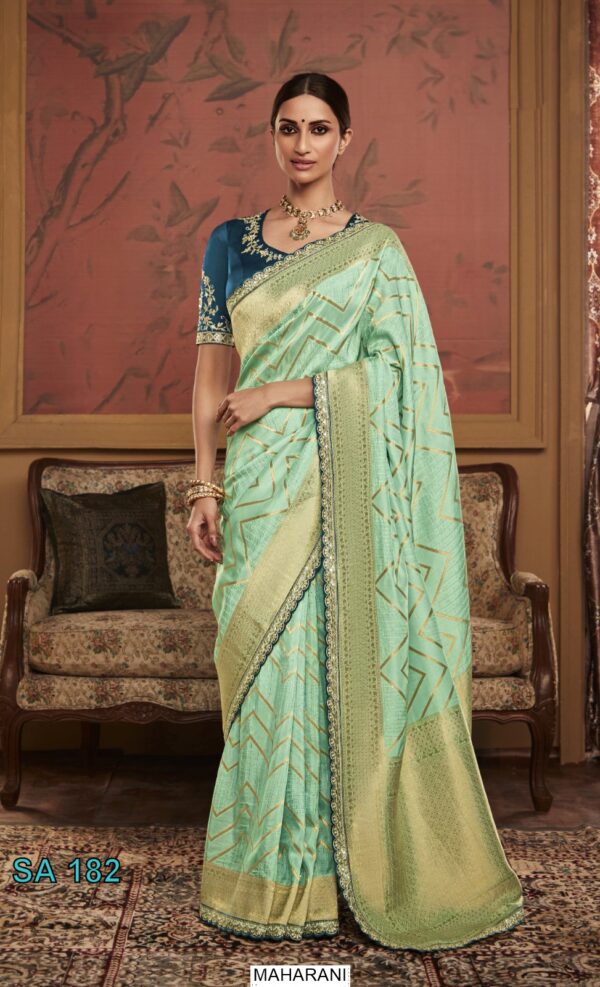 Drape Yourself In Elegance With This Soft And Silky Dola Silk Un-Stitched Saree With Blouse
