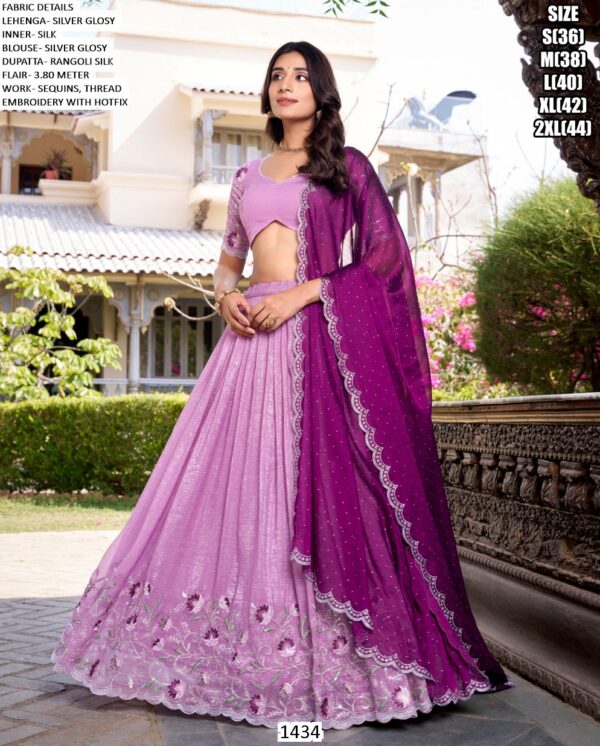 Get Ready To Dazzle In This Beautifully Crafted Silver Glossy Lehenga Choli