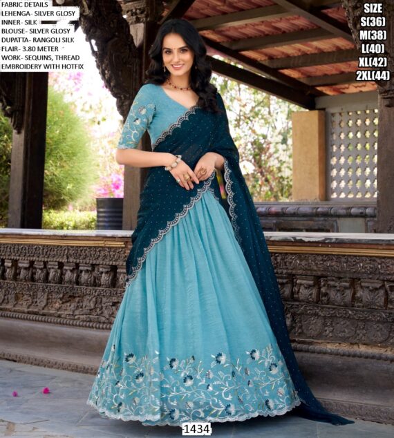 Get Ready To Dazzle In This Beautifully Crafted Silver Glossy Lehenga Choli