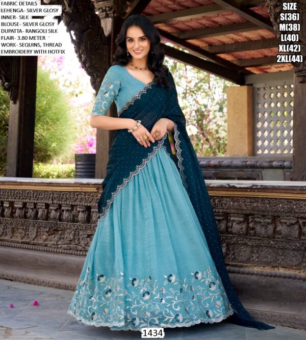 Get Ready To Dazzle In This Beautifully Crafted Silver Glossy Lehenga Choli