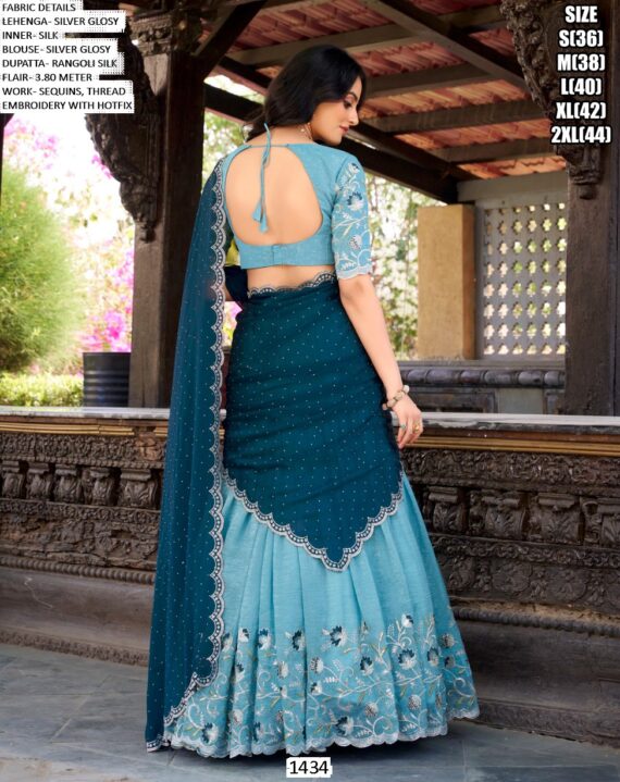 Get Ready To Dazzle In This Beautifully Crafted Silver Glossy Lehenga Choli