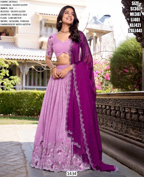 Get Ready To Dazzle In This Beautifully Crafted Silver Glossy Lehenga Choli
