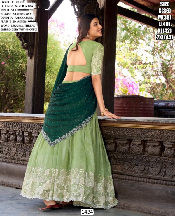 Get Ready To Dazzle In This Beautifully Crafted Silver Glossy Lehenga Choli