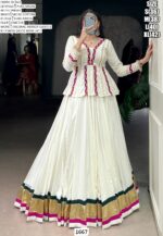 Exude Timeless Charm In This White Pure Rayon Embossed Navratri Lehenga Choli