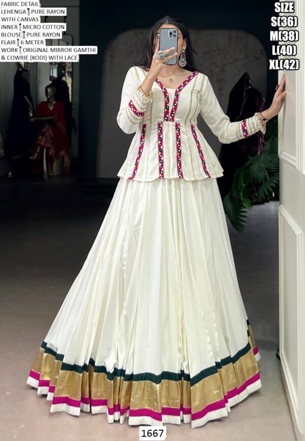Exude Timeless Charm In This White Pure Rayon Embossed Navratri Lehenga Choli