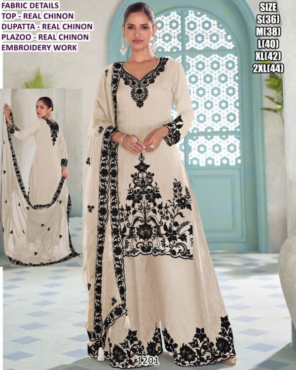 Get Praised For Your Beauty And Charm With This Black And White Coloured Designer Plazo Suit