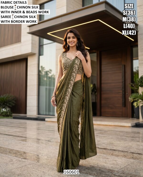 Graceful Party Wear Saree With Heavy Blouse Detailing