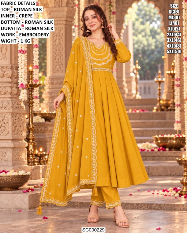 Festive Embroidered Silk Suit With Tassel Details