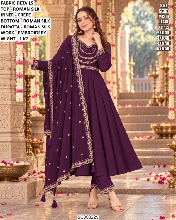 Festive Embroidered Silk Suit With Tassel Details