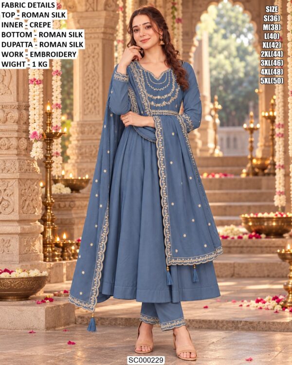 Festive Embroidered Silk Suit With Tassel Details